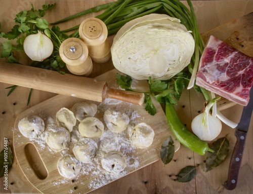 Cookind dumpling with meat and vegetables photo