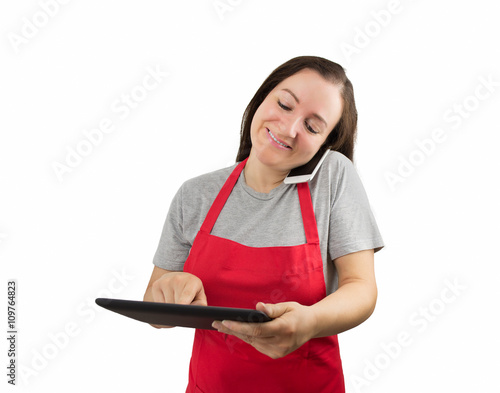 worker woman with apron multitasked photo