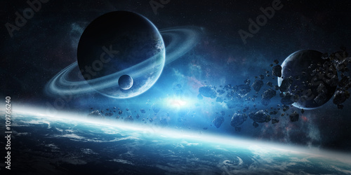Fototapeta Naklejka Na Ścianę i Meble -  Sunrise over group of planets in space