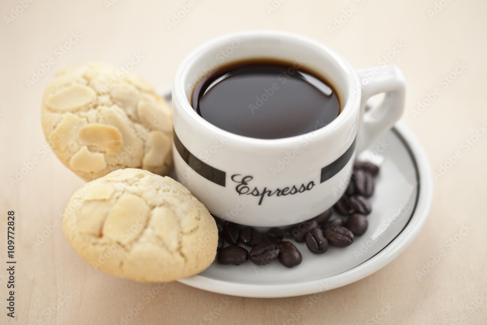 cookie on saucer with coffee drink cookie on saucer with coffee drink