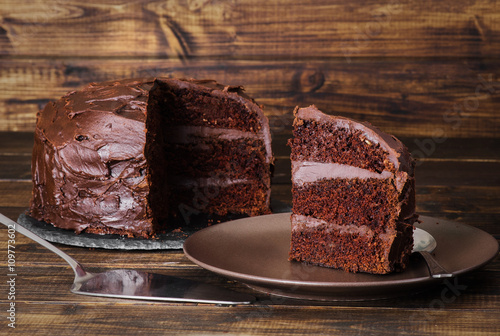 Принти на полотні Chocolate cake on dark wooden bckground