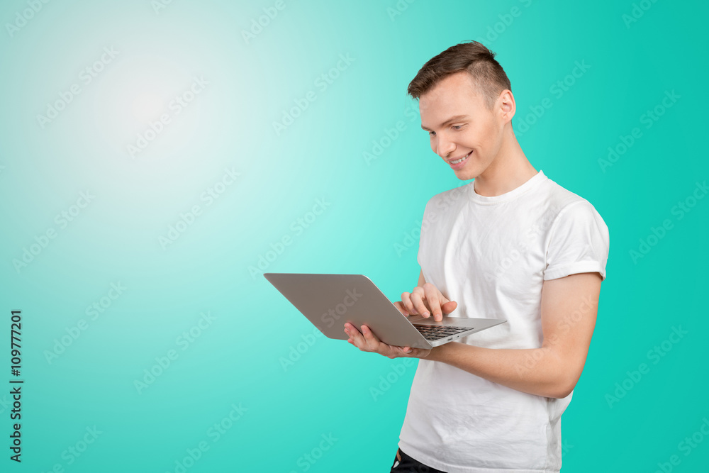 Happy young man with laptop Happy young man with laptop