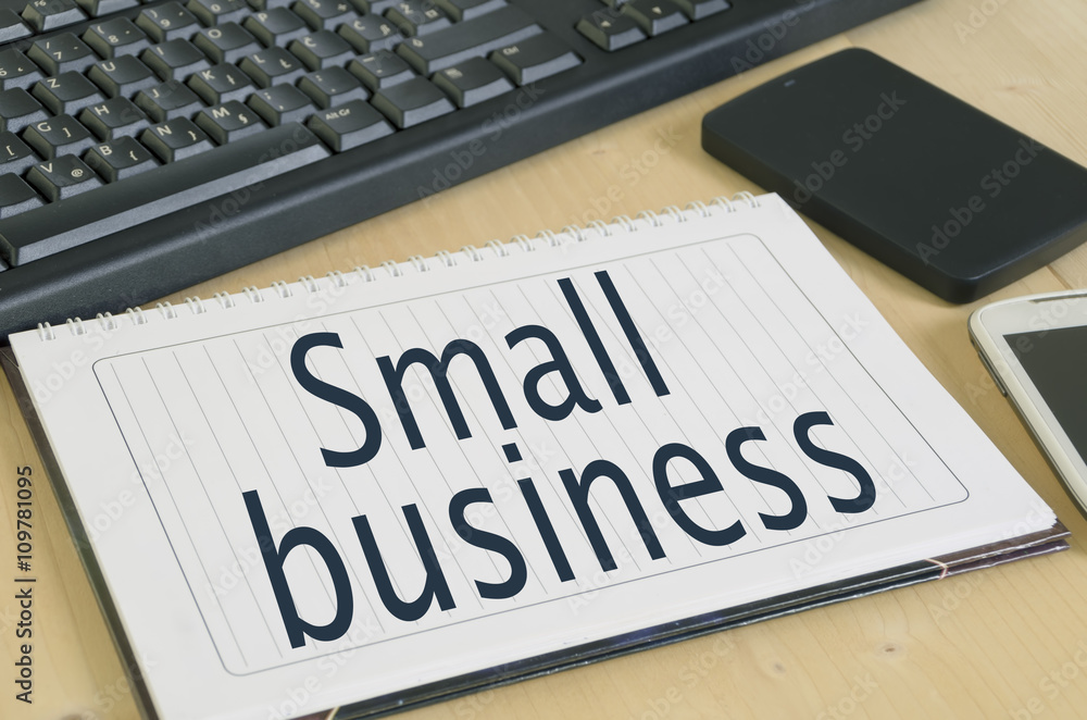 Small Business title on working table Small Business title on working table