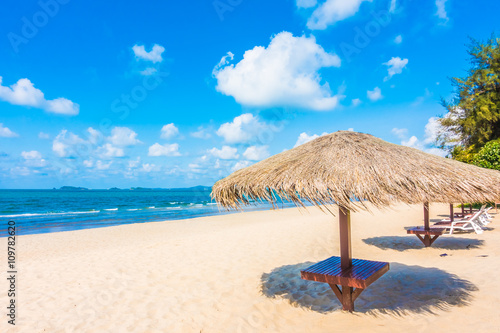 Umbrella and chair on the beach