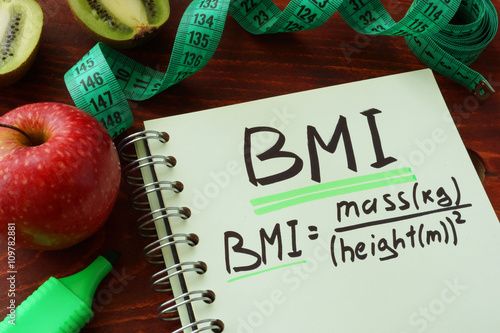 BMI body mass index  (metric formula) written on a notepad sheet. photo
