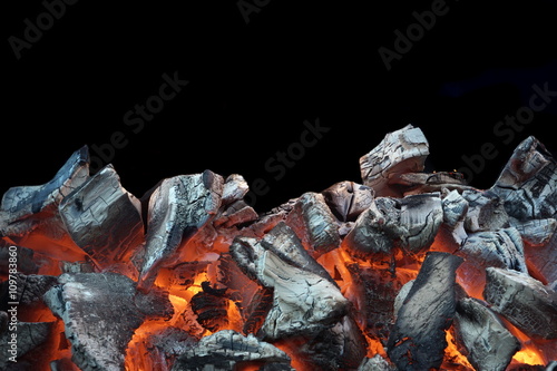 Obraz na plátně Flaming Charcoal Isolated On Black Background