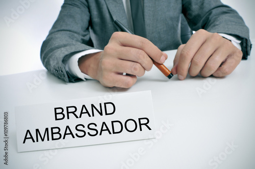 man and name plate with the text brand ambassador