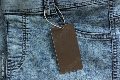 Blue jeans with blank paper label