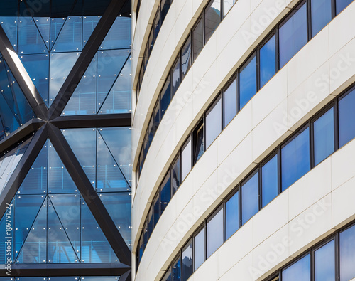 Abstract modern building. Close-up view of the modern building of steel and glass. Modern architecture.