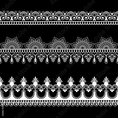 Border line lace mehndi elements in Indian style for card and tattoo isolated on black background.