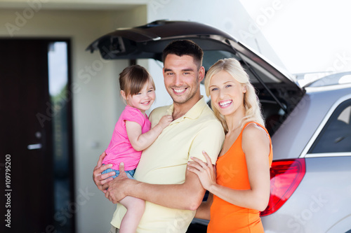 happy family with hatchback car at home parking © Syda Productions