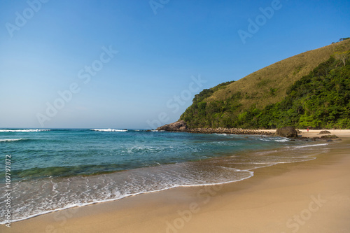 Beautiful blue water and sky in Beach Mole (praia Mole) in Florianopolis, Santa Catarina, Brazil. © LMspencer