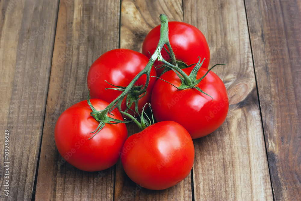 Branch of ripe tomatoes Branch of ripe tomatoes
