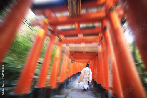 Red Tori Gate at Fushimi Inari Shrine in Kyoto, Japan, selective