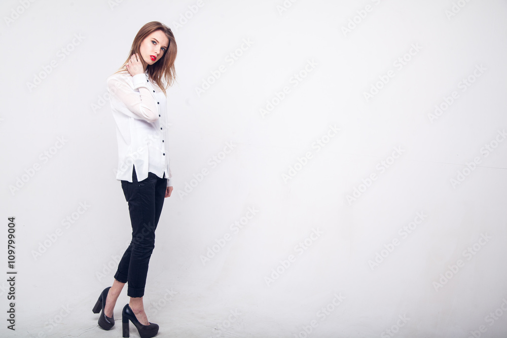 Contemporary Clothing Design. Modish Woman in White Blouse and Pants. Fashion
