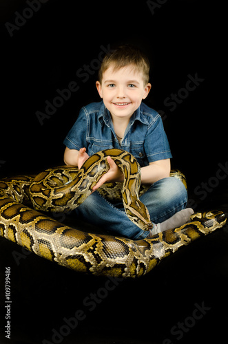 happy kid and giant snake   