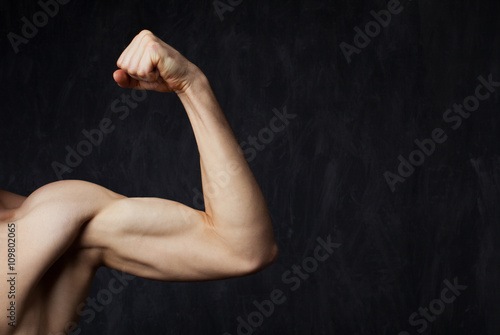 Vászonkép Close-up of a power fitness man's hand.