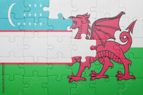 puzzle with the national flag of wales and uzbekistan