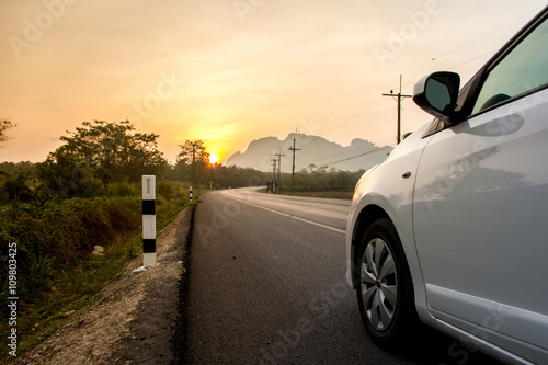 Sunny day at a country, the view on the road level beside the ca