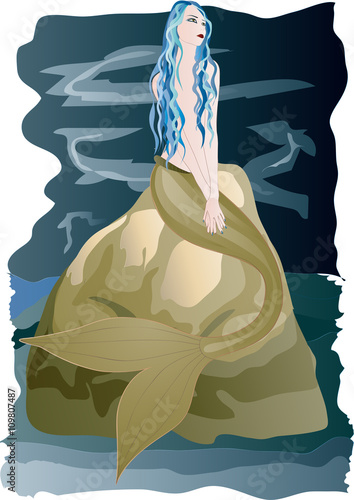 Beautiful  mermaid sitting on rock by the sea