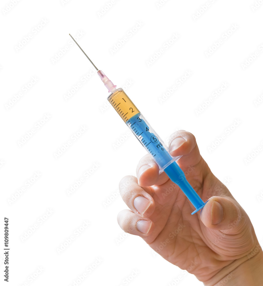 Hand holds syringe. Vaccination concept. Isolated on white background. Hand holds syringe. Vaccination concept. Isolated on white background.