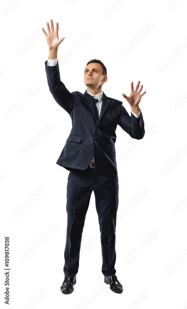 Businessman touching invisible wall. Businessman touching invisible wall.