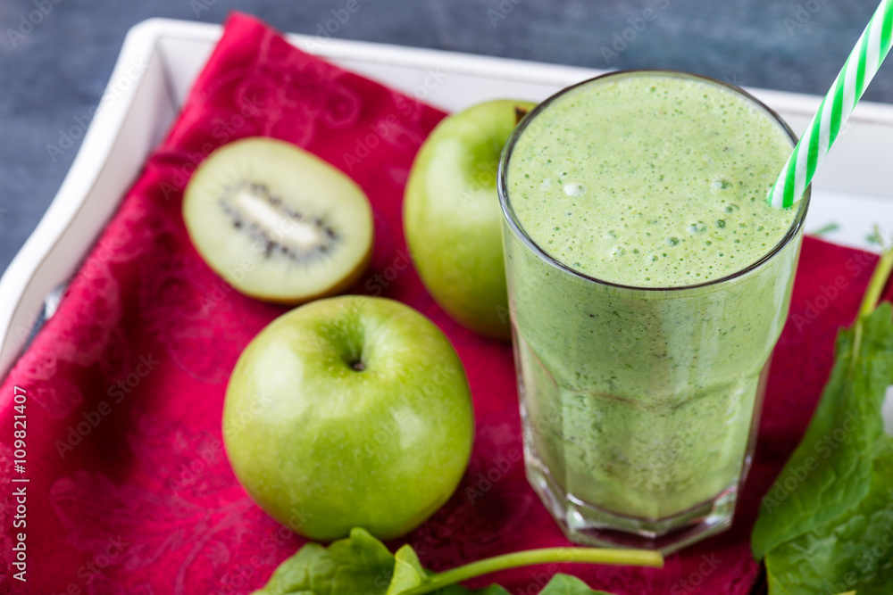green smoothie with spinach, kiw iand apple on a tray, selective focus green smoothie with spinach, kiw iand apple on a tray, selective focus