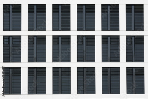 18 windows with jalousie office building facade