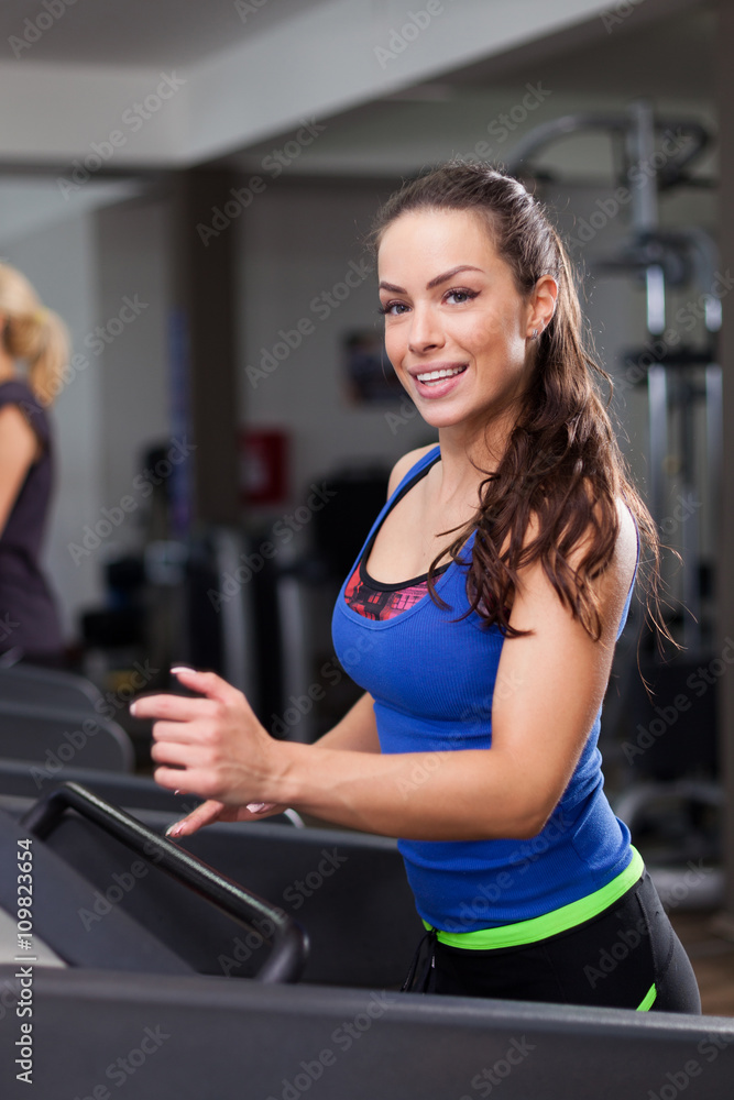 Woman Running on Treadmill