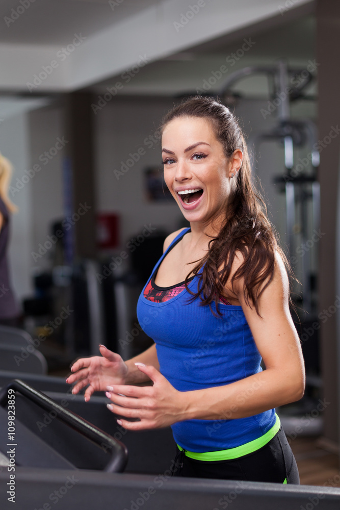 Beautiful brunette on a treadmill Beautiful brunette on a treadmill
