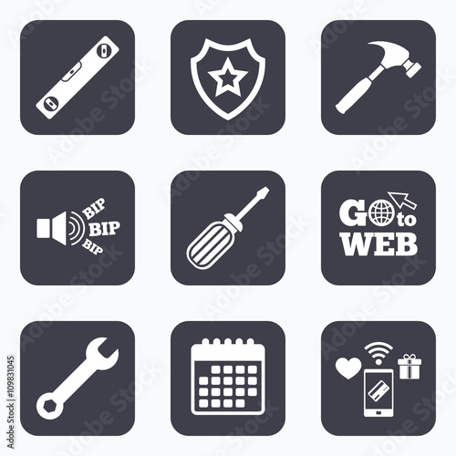 Screwdriver and bubble level, hammer.