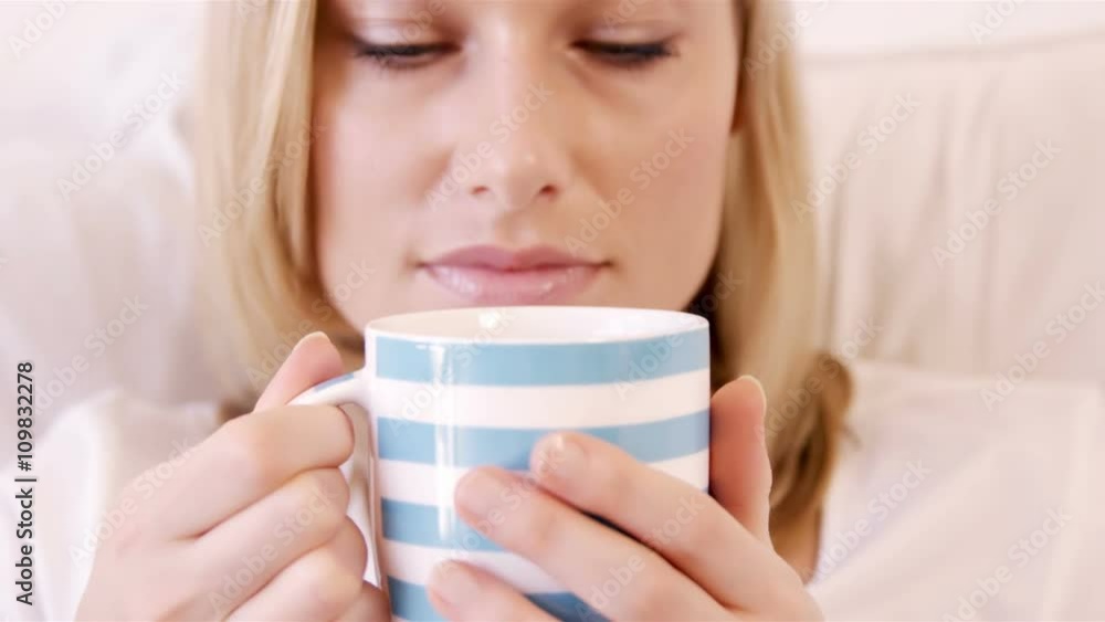 Young woman drinking coffee Young woman drinking coffee