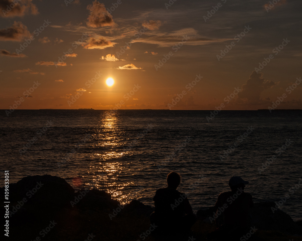 People watching sunset