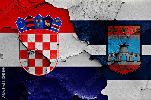 flags of Croatia and Osijek-Baranja County painted on cracked wall photo