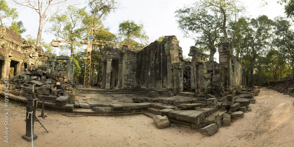 Restoration works at the Ta Prohm Temple in Angkor. Cambodia Restoration works at the Ta Prohm Temple in Angkor. Cambodia