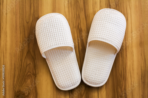 slippers on wood background