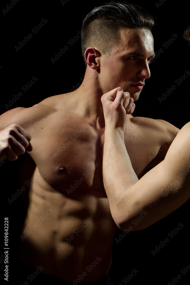 Fototapeta premium Young muscular men boxing