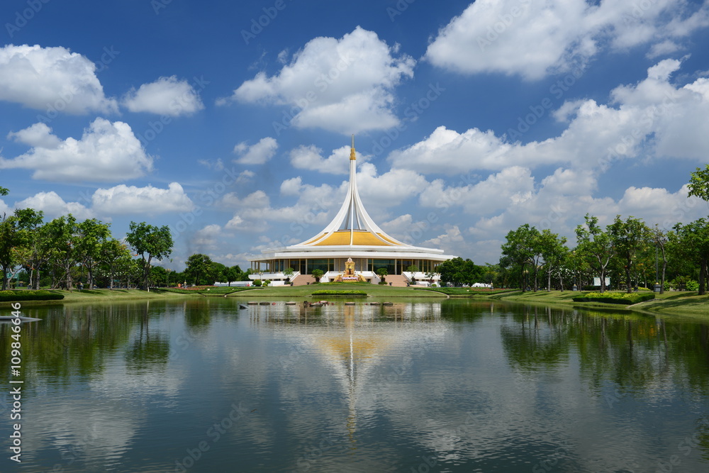 Royal garden Rama IX, Thailand. Blue sky after running competition on May 17, 2015 There are many people come to join competition, and some of them walk around the garden.