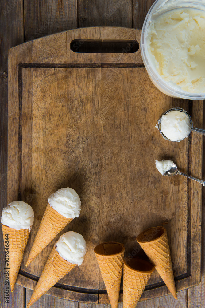 creamy vanilla ice cream in preparation with rustic background a