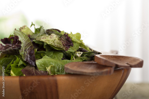 cropped image of vegetable salad in wooden bowl