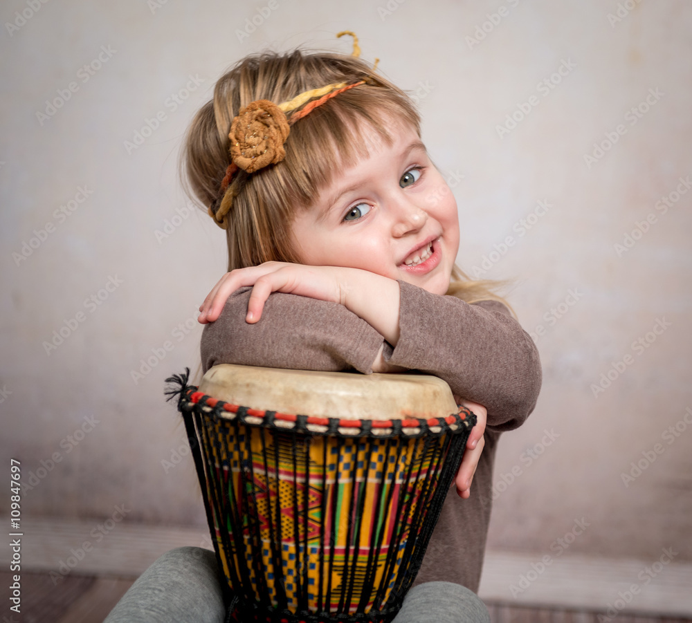 cute little girl playing drum Stock Photo Adobe Stock