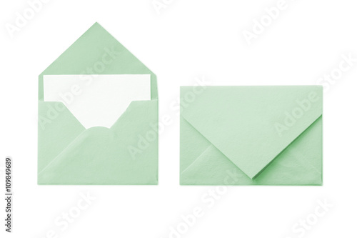 Green envelope with blank white card isolated on white background