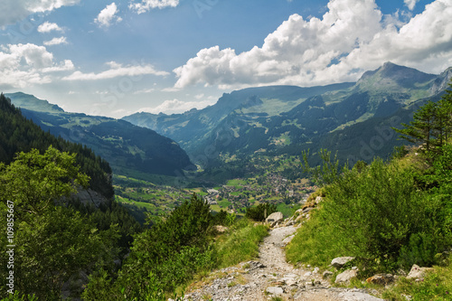 Beautiful idyllic Alps landscape and trail, mountains in summer, Switzerland 