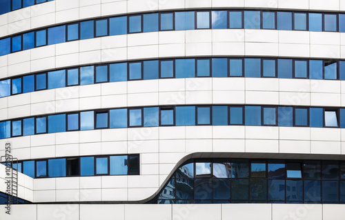 Close-up of a modern building of steel and glass. Modern architecture.