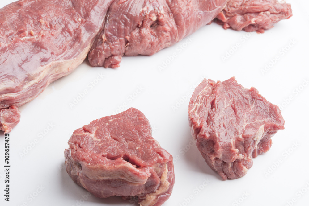 Obraz premium raw beef isolated on white background