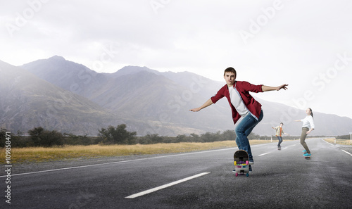 Young people riding skateboard
