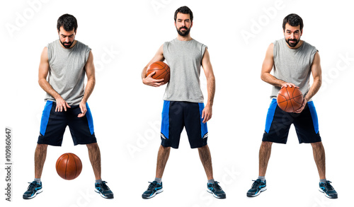 Man playing basketball © luismolinero