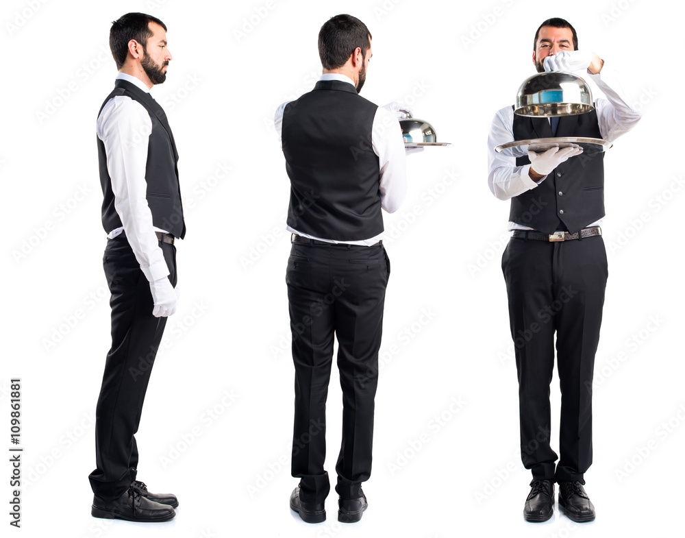 Luxury waiter holding a tray Luxury waiter holding a tray