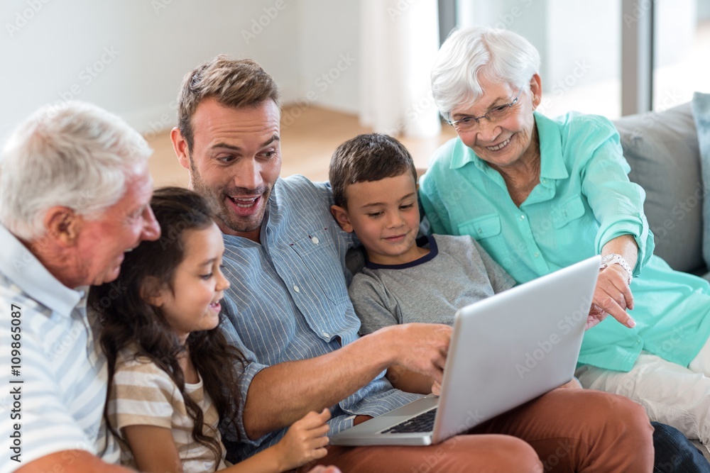 Happy family sitting on sofa Happy family sitting on sofa