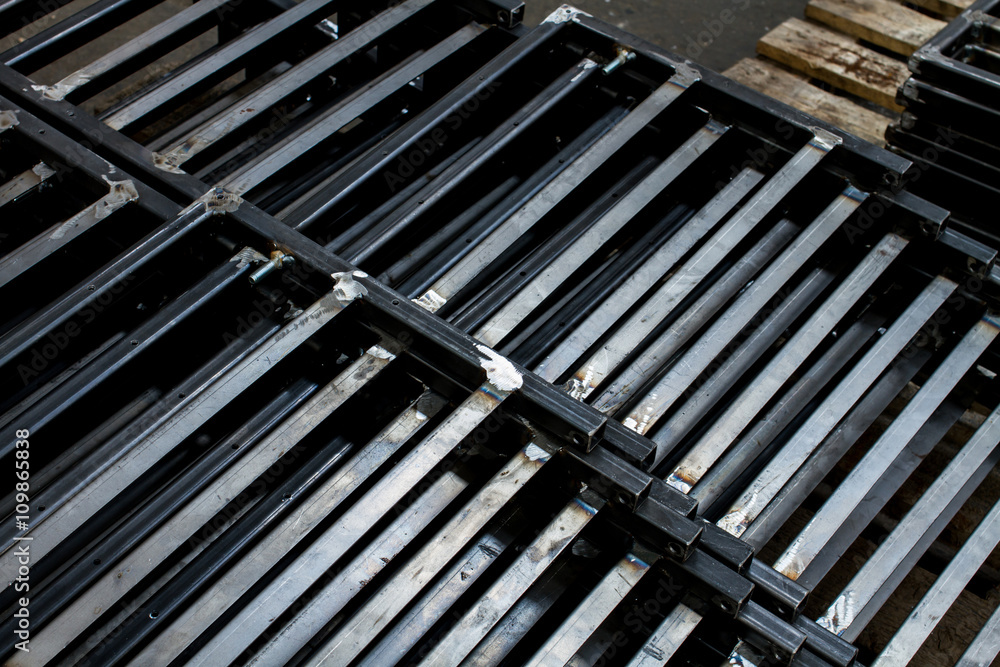 close up of metal work, metal pipes welded, beams welded together close up of metal work, metal pipes welded, beams welded together